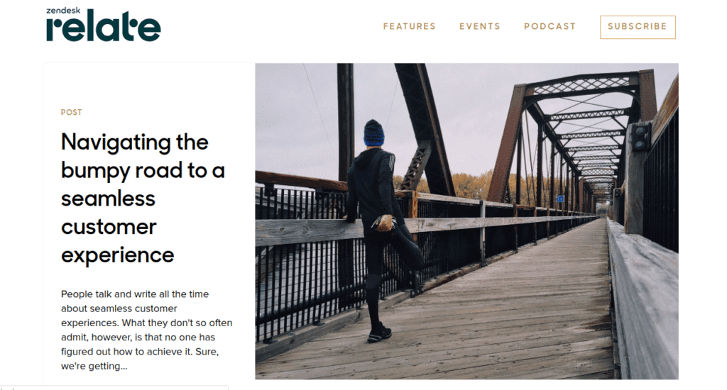 Screenshot of Zendesk's blog post with a man in black jumpsuit ready to run on a bridge. – Revenuegrid