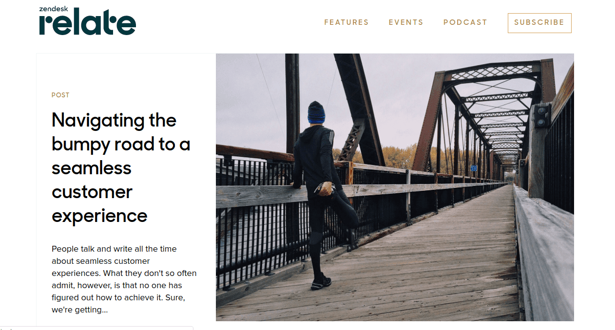 Screenshot of Zendesk’s blog post with man in black jumpsuit ready to run on a bridge.